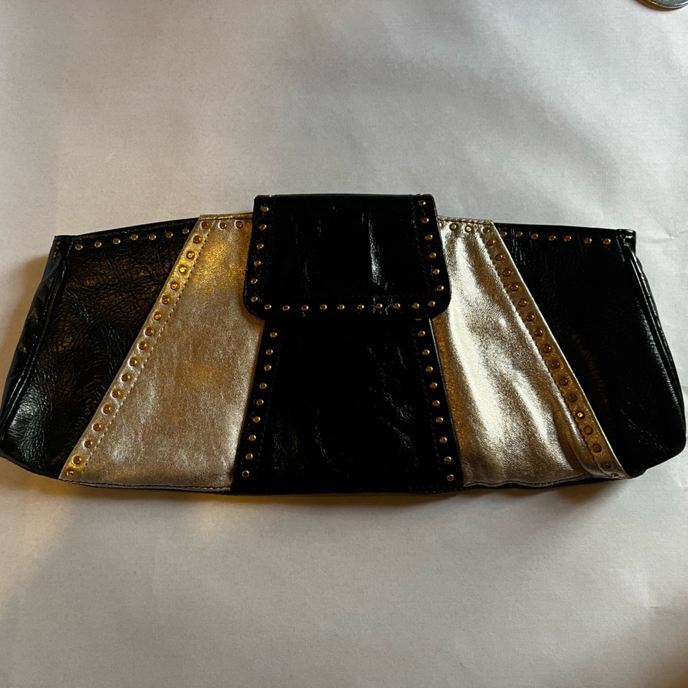 TOPSHOP CLUTCH HANDBAG
black and gold studded leather clutch